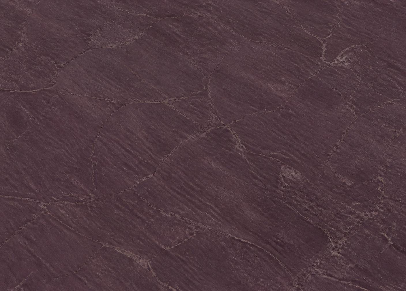 Brushed face of Shahabad Maroon limestone showing a fine directional grain