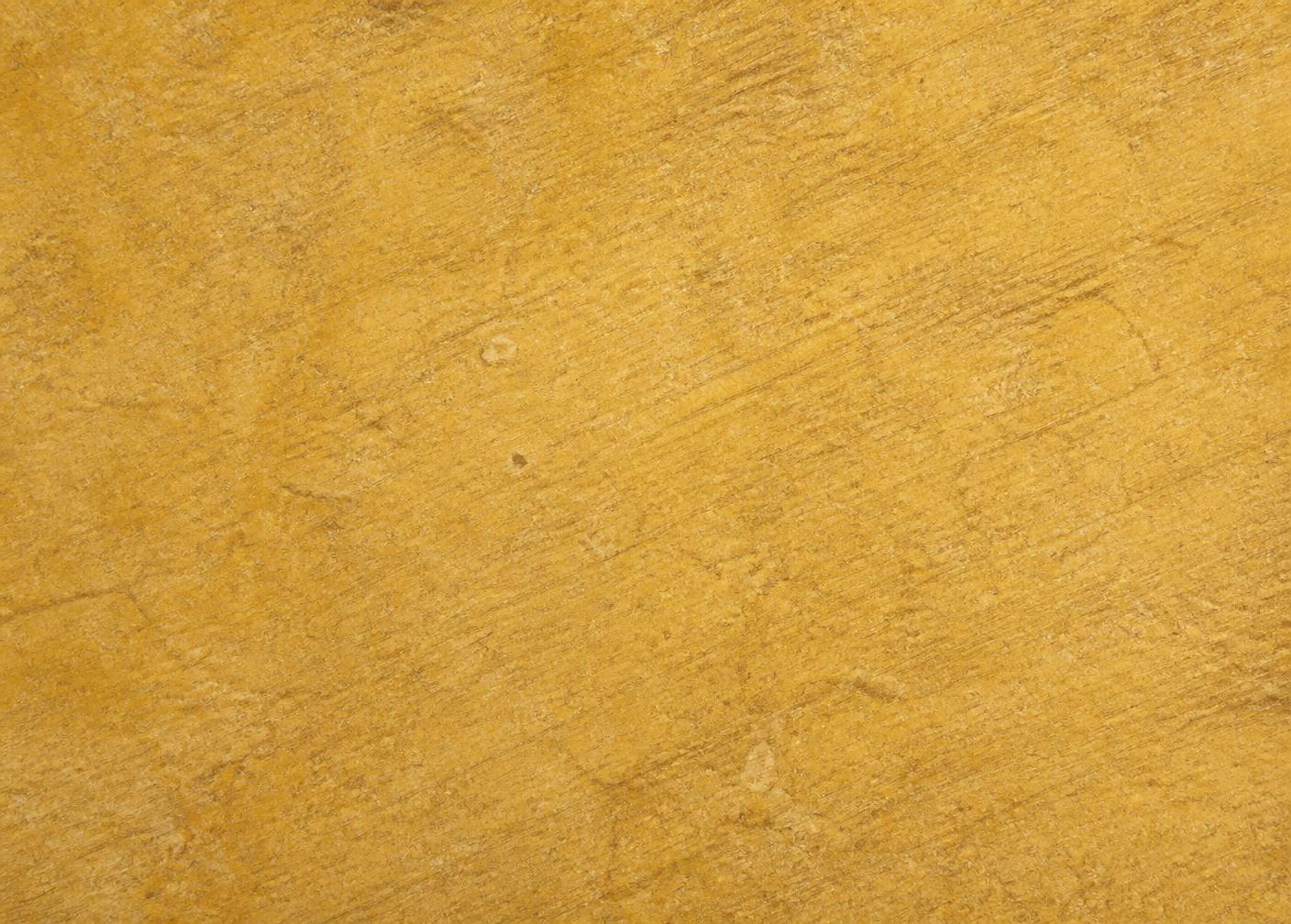 Brushed face of Shahabad Yellow limestone showing a fine directional grain
