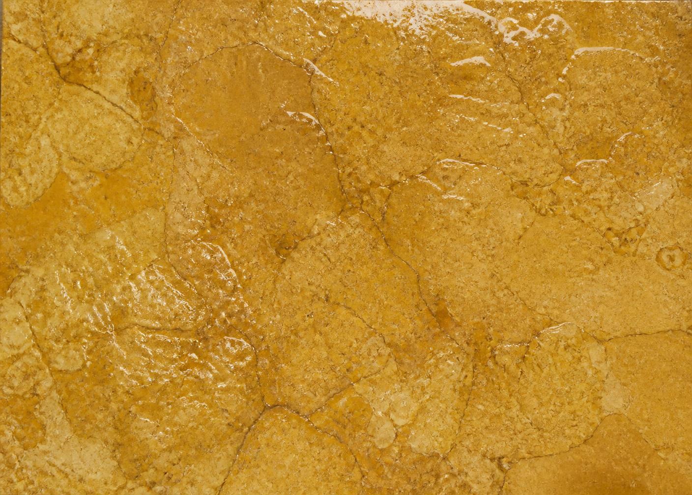 Shahabad Yellow limestone with water across the surface, showing how far the colour deepens when wet